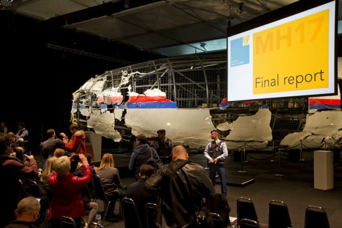 Part of the reconstructed Malaysia Airlines Flight 17 plane in 2015. Photo: Peter Dejong / Associated Press