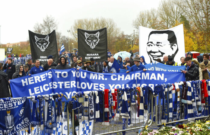Fans on a memorial walk Saturday for those who lost their lives in the Leicester City helicopter crach including Leicester City Chairman Vichai Srivaddhanaprabha ahead of the Premier League match at the King Power Stadium, Leicester, England. Photo: Joe Giddens / Associated Press