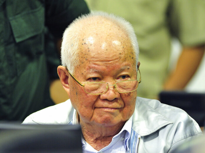 In this photo released by the Extraordinary Chambers in the Courts of Cambodia, Khieu Samphan, former Khmer Rouge head of state, sits Friday in a court room before a hearing at the U.N.-backed war crimes tribunal in Phnom Penh, Cambodia. Photo: Mark Peters / Extraordinary Chambers in the Courts of Cambodia