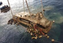 Officials Recover Capsized Phuket Ship that Killed 47 Chinese In this photo taken and released by the Thailand Phuket Public Affairs Office, Saturday, Nov. 17, 2018, the tour boat named the Pheonix is raised from the sea floor after sinking over four months ago in rough weather killing 47 tourists. Photo: Phuket Public Affairs Office via AP