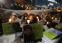 Dispute Between Seoul, Tokyo Over WWII Brothels Explained College students hold portraits of the deceased former South Korean sex slaves who were forced to serve for the Japanese military in World War II, and lit candles during a rally against Japanese government in front of the Japanese Embassy in Seoul, South Korea. Photo: Ahn Young-joon / Associated Press