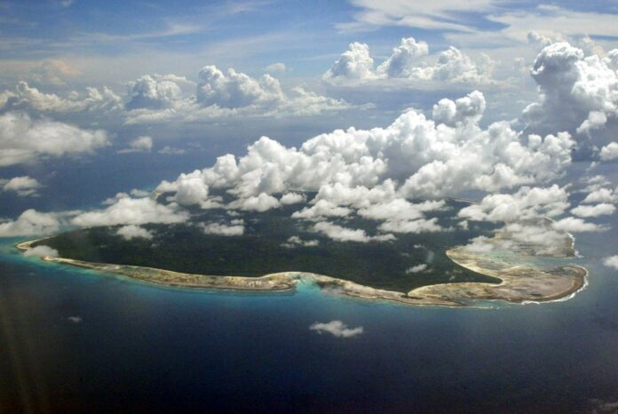 Clouds hang over the North Sentinel Island, in 2005 in India's southeastern Andaman and Nicobar Islands. Photo: Gautam Singh / Associated Press