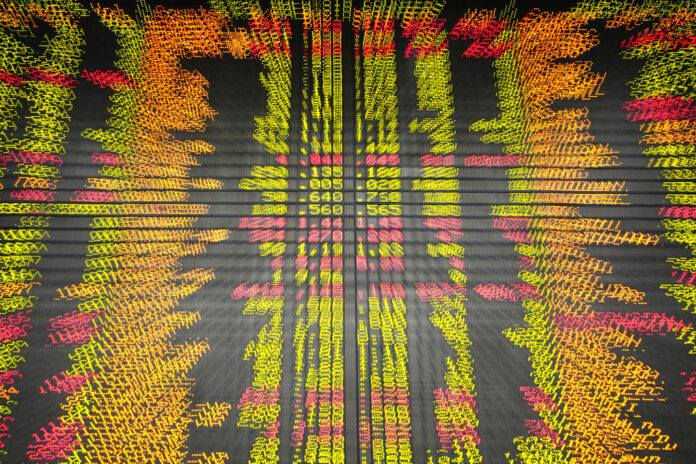 An electronic board displays stock prices Friday at a private stock market gallery in Kuala Lumpur, Malaysia. Photo: Yam G-Jun / Associated Press