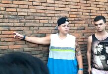 No Jail Time for Tourists Who Vandalized Chiang Mai Wall Lee Furlong, right, and Brittney Schneider, left, at the Tha Pae Gate wall Oct. 18.