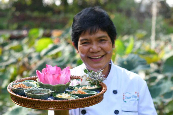 Banyen Ruangsantheia holds a tray of Lotus Wraps in November 2018, soon after she won her first Michelin star.