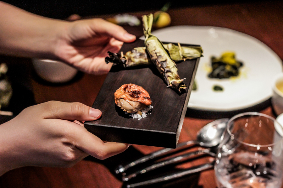 Dip, a dish of grilled paddy crab with coconut milk-toasted sticky rice. 