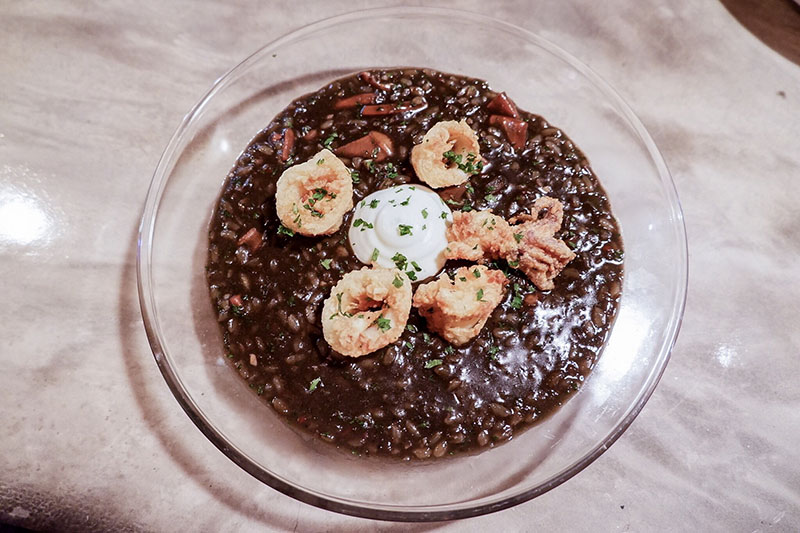 Black squid ink rice (320 baht).