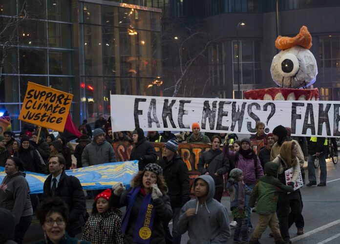 People in 2017 march through Minneapolis, Minnesota to protest the inauguration of Republican President Donald Trump. Photo: Fibonacci Blue / Wikimedia Commons