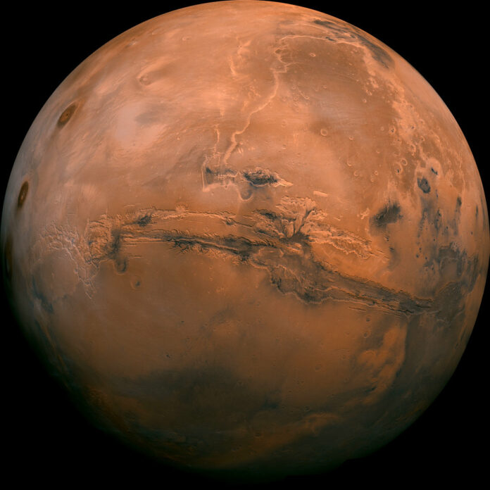 Mars in a composite photo created from over 100 images of the planet taken by Viking Orbiters in the 1970s. Image: NASA Mars in a composite photo created from over 100 images of the planet taken by Viking Orbiters in the 1970s. Image: NASA