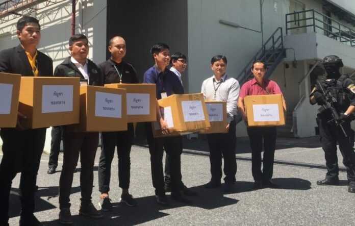 Health officials receive a 100-kilogram batch of marijuana from police on Sept. 25, 2018.