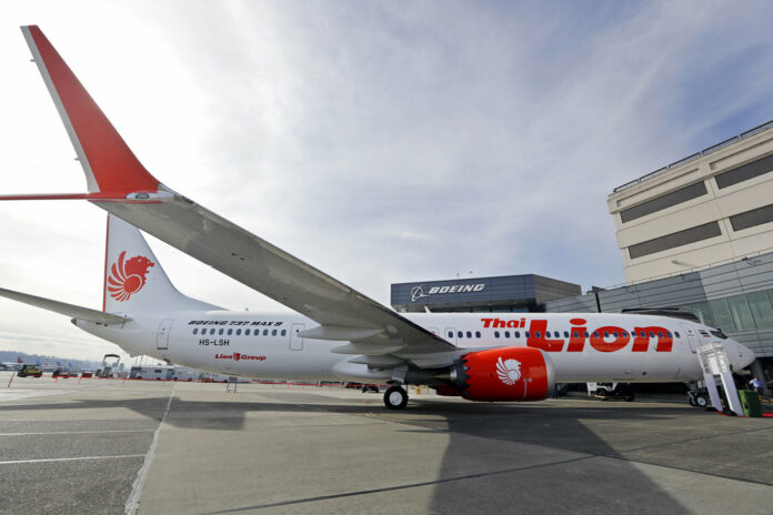 Boeing's first 737 MAX 9 jet at the company's delivery center before a ceremony transferring ownership to Thai Lion Air in Seattle in a March 2018 file photo. Photo: Elaine Thompson / Associated Press Boeing's first 737 MAX 9 jet at the company's delivery center before a ceremony transferring ownership to Thai Lion Air in Seattle in a March 2018 file photo. Photo: Elaine Thompson / Associated Press