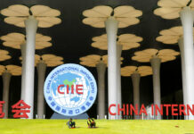 China Seeks to Rebrand Global Image With Import Expo Workers last week prepare a lawn outside the venue for the upcoming China International Import Expo in Shanghai. Photo: Chinatopix / AP