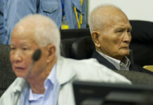 Last Khmer Rouge Leaders Guilty of Genocide, Get Life Terms Khieu Samphan, at left, former Khmer Rouge head of state, and Nuon Chea, at right, who was the Khmer Rouge's chief ideologist and No. 2 leader, sit in the court hall at the U.N.-backed war crimes tribunal in Phnom Penh in an October 2013 file photo released by the Extraordinary Chambers in the Courts of Cambodia. Photo: Mark Peters / Extraordinary Chambers in the Courts of Cambodia via AP