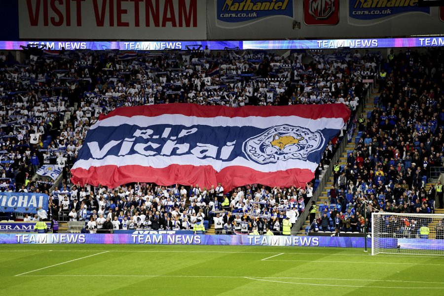 Leicester City fans with a giant banner that reads 'RIP Vichai' during the English Premier League soccer match between Cardiff City and Leicester City at the Cardiff City Stadium in Cardiff, Wales. Photo: Simon Galloway / PA via AP