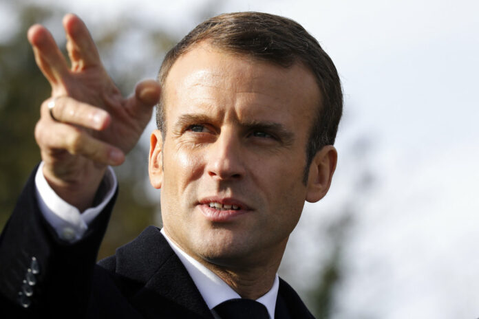 French President Emmanuel Macron arrives Tuesday to the Trottoir necropolis in Les Eparges, eastern France to mark the centenary of the end of First World War. Photo: Ludovic Marin via AP