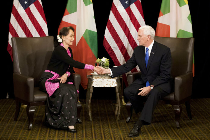 U.S. Vice President Mike Pence, at right, meets Myanmar leader Aung San Suu Kyi on Wednesday in Singapore. Photo: Bernat Armangue / Pool