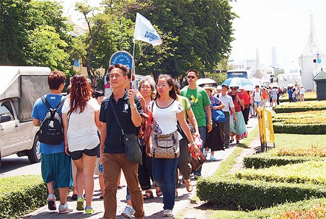 A file photo of Chinese tourists in front of the Grand Palace.