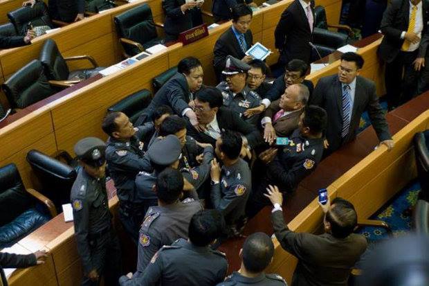 Lawmakers are locked in a scuffle during a particularly unruly session in May 2012.