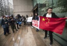 China Detains Canadian Diplomat Hours Before Huawei CFO Gets Bail