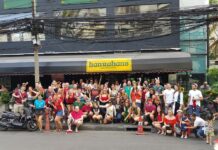 A Drunken Sway Through Bangkok’s ‘12 Pubs of Christmas’ Participants of the "12 Pubs of Christmas" pose for a photo Dec. 1 in front of Hanrahans bar in Nana area, Bangkok.