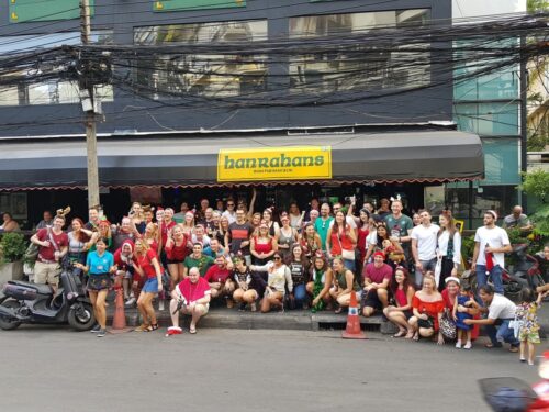 Participants of the "12 Pubs of Christmas" pose for a photo Dec. 1 in front of Hanrahans bar in Nana area, Bangkok.