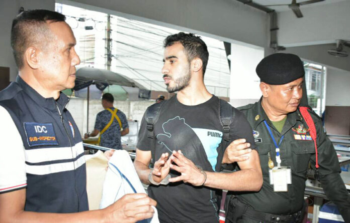 Hakeem Ali Mohamed Ali AlAraibi led in handcuffs at the Thai Criminal Court.