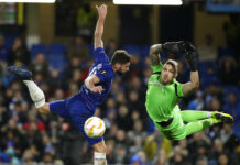 UEFA Launches Third European Club Competition From 2021 Chelsea's Oliver Giroud, left, and PAOK's goalkeeper Alexandros Paschalakis compete for the ball Thursday during the Europa League Group L soccer match between Chelsea and PAOK at Stamford Bridge stadium, in London. Photo: Matt Dunham / Associated Press