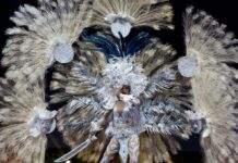 Week’s Asia Photos: Thailand Hosts Miss Universe as Enemies Shake Hands Miss El Salvador Marisela de Montecristo displays her costume Monday during Miss Universe National Costume Show in Chon Buri, Thailand. Photo: Gemunu Amarasinghe / Associated Press