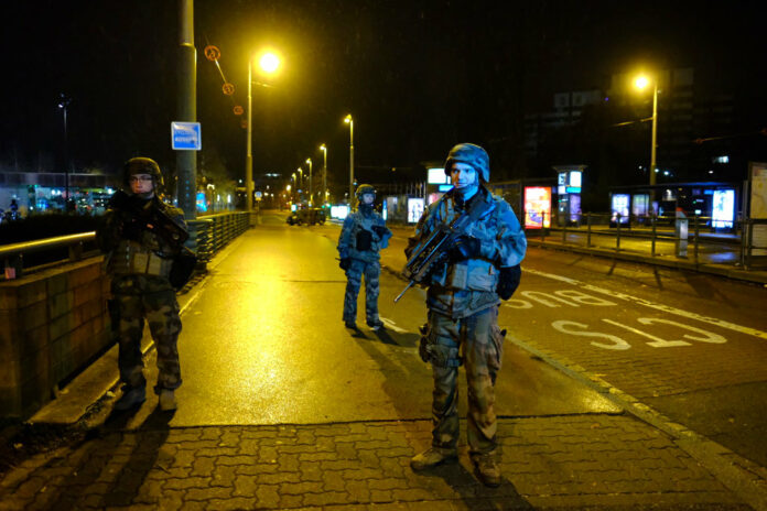Soldiers patrol after a shooting Tuesday in Strasbourg, eastern France. Photo: Associated Press