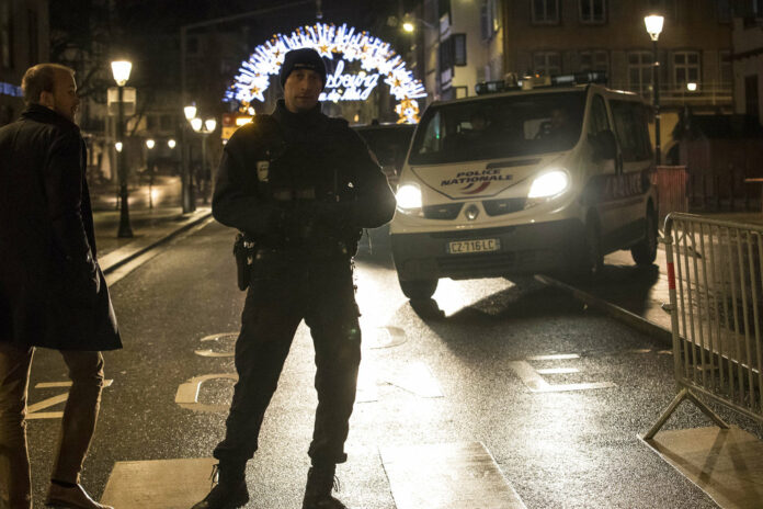 Emergency services patrol Tuesday at the center of the city of Strasbourg following a shooting, eastern France. Photo: Jean-Francois Badias / Associated Press