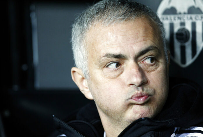 Manchester United coach Jose Mourinho looks out from the bench Wednesday prior a Group H Champions League soccer match between Valencia and Manchester United at the Mestalla Stadium in Valencia, Spain. Photo: Alberto Saiz / Associated Press