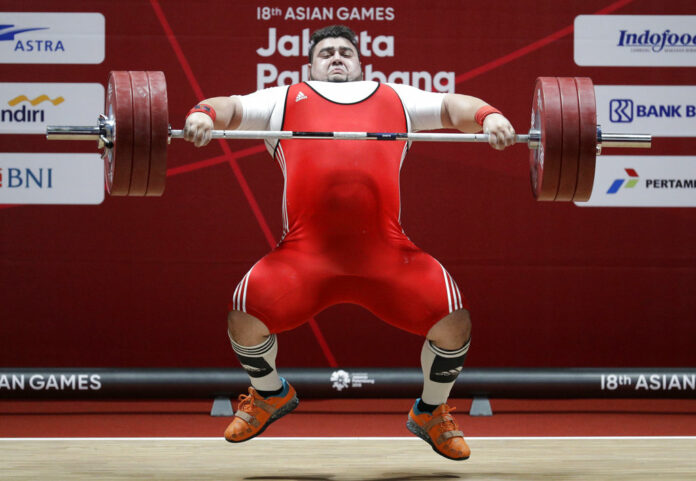 Pakistan's Muhammad Nooh Butt compete at the men's +105kg weightlifting at the 18th Asian Games in August in Jakarta, Indonesia. Photo: Aaron Favila / Associated Press