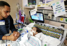 Yemeni Mother Wins Fight to Fly to US and Give Dying Son a Kiss This recent but undated photo, released Monday, shows Ali Hassan with his dying 2-year-old son Abdullah in a Sacramento, California hospital. Photo: Associated Press