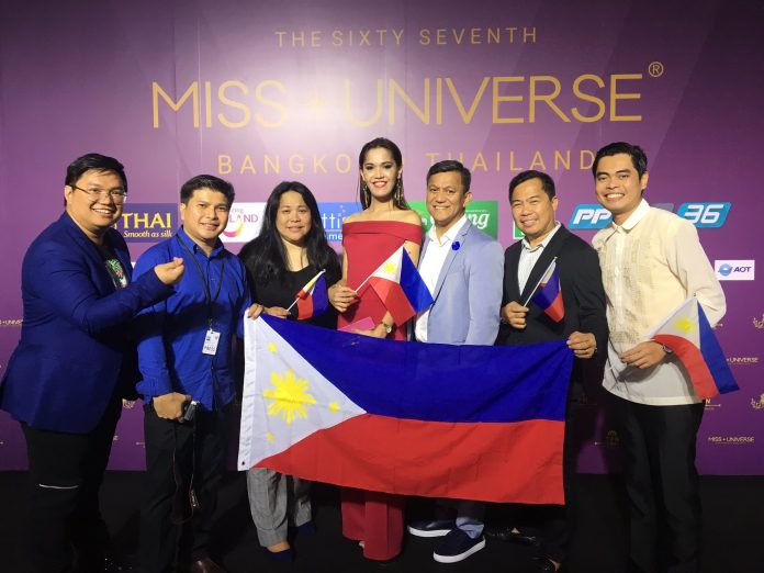 Filipino pageant fans at Muang Thong Thani after watching the Miss Universe 2018 finals. Jesson Capuchino is at far left, Mikee Obial is at center and Jap Doble Bombarda is at far right.