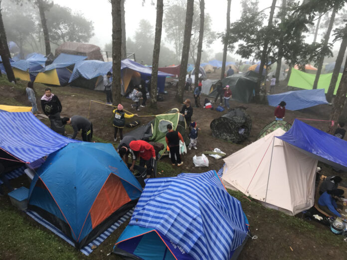 Campers in the Doi Pha Hom Pok National Park on Monday, New Year’s Eve.