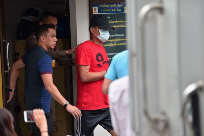 Kantapong Huadsri was being taken to the Criminal Court Wednesday after police inquiry. Kantapong Huadsri was being taken to the Criminal Court Wednesday after police inquiry.