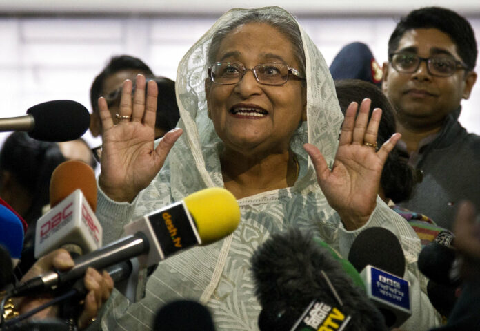 Bangladesh Prime Minister Sheikh Hasina speaks to the media after casting her vote Sunday in Dhaka, Bangladesh. Photo: Anupam Nath / Associated Press