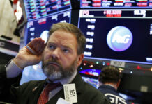 Asian Shares Rise on Wall Street Gains Amid Trade Friction Trader Thomas McCauley works Thursday on the floor of the New York Stock Exchange. Photo: Richard Drew / Associated Press
