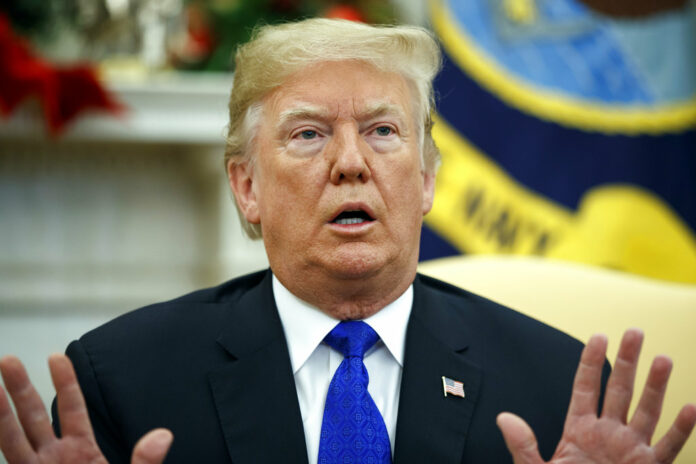 President Donald Trump speaks at a Dec. 11 meeting with Democratic leaders in the Oval Office in Washington. Photo: Evan Vucci / Associated Press