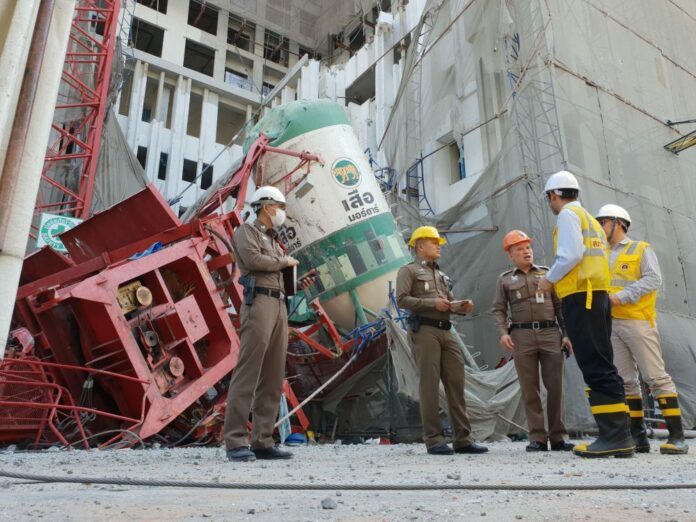 Police and engineers on Thursday at the construction site where a crane collapsed and killed five people in Bangkok.