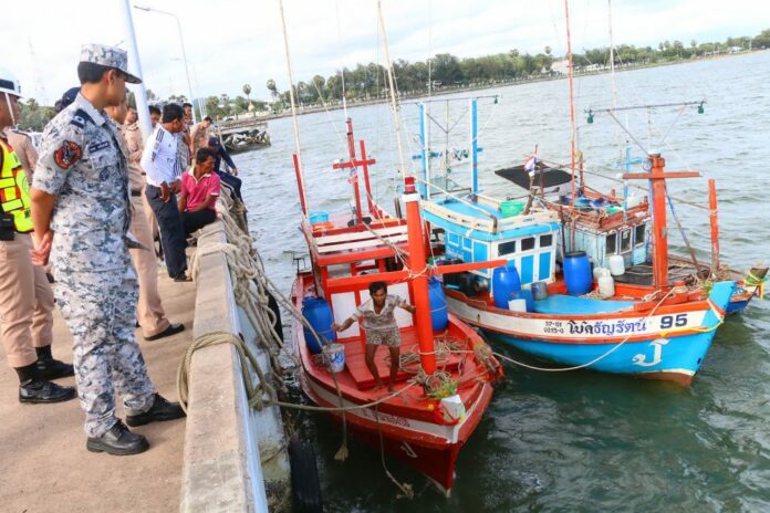 Navy officials in Chonburi province seize fishing boats that fail to comply with fishery regulations in May 2016.