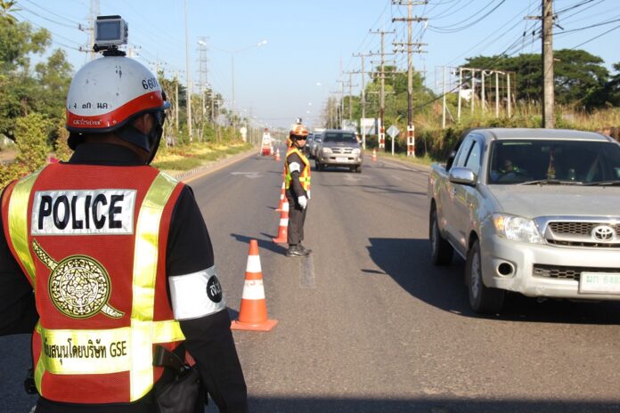 Traffic police man a checkpoint on Dec. 19, 2016, in Sakon Nakhon province.