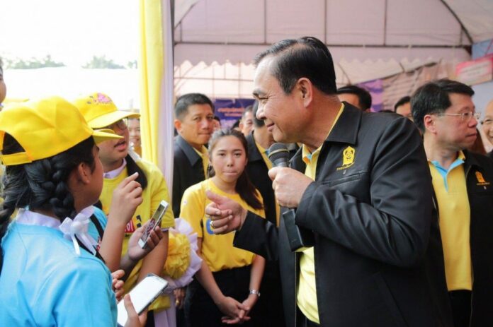 Gen. Prayuth Chan-ocha with children for Children’s Day on Saturday. Photo: ประยุทธ์ จันทร์โอชา Prayut Chan-o-cha / Facebook