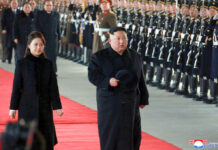 NKorea Leader Arrives in China for Summit In this Monday, Jan. 7, 2019, photo provided on Tuesday, Jan. 8, 2019 by the North Korean government, North Korean leader Kim Jong Un walks with his wife Ri Sol Ju at Pyongyang Station in Pyongyang, North Korea, before leaving for China. Photo: Korean Central News Agency / Korea News Service via AP