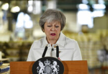UK Leader in Frantic Final Push to Win Brexit Deal Backing Britain's Prime Minister Theresa May delivers a speech Monday during a visit to the Portmeirion pottery factory in Stoke-on-Trent, England. Photo: Ben Birchall / Associated Press