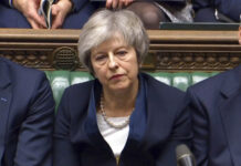 UK’s May Faces No-Confidence Vote After Brexit Plan Crushed In this grab taken from video, Britain's Prime Minister Theresa May listens to Labour leader Jeremy Corbyn speaking Tuesday after losing a vote on her Brexit deal, in the House of Commons, London. Photo: Associated Press
