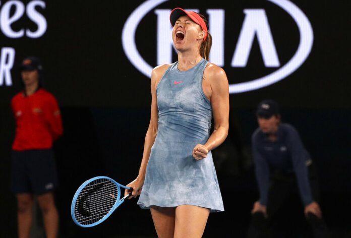 Russia's Maria Sharapova celebrates a point win over Denmark's Caroline Wozniacki during their third round match Friday at the Australian Open tennis championships in Melbourne, Australia. Photo: Kin Cheung / Associated Press