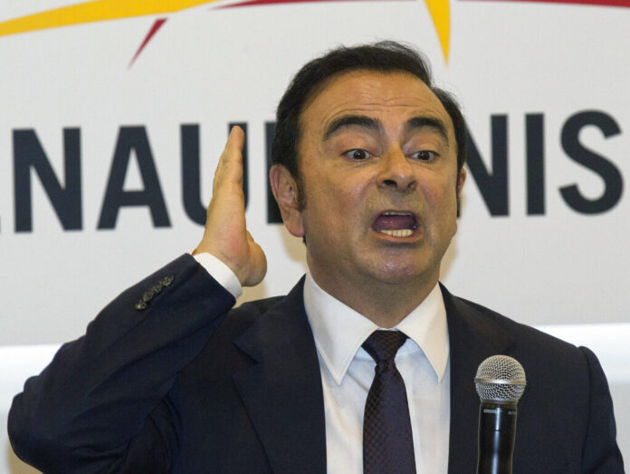 Then Renault-Nissan's CEO Carlos Ghosn speaks in 2016 during a press conference held at Auto China 2016 in Beijing, China. Photo: Ng Han Guan / Associated Press