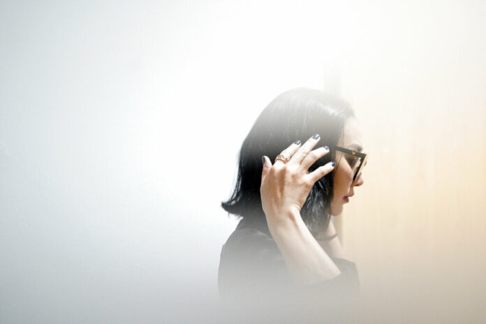 In this photo taken through frosted glass, Burmaa Oyubchineg, cousin of the murdered Mongolian model Altantuya Shaariibuu, arrives Wednesday at Shah Alam High Court in Shah Alam, Malaysia. Photo: Yam G-Jun / Associated Press In this photo taken through frosted glass, Burmaa Oyubchineg, cousin of the murdered Mongolian model Altantuya Shaariibuu, arrives Wednesday at Shah Alam High Court in Shah Alam, Malaysia. Photo: Yam G-Jun / Associated Press
