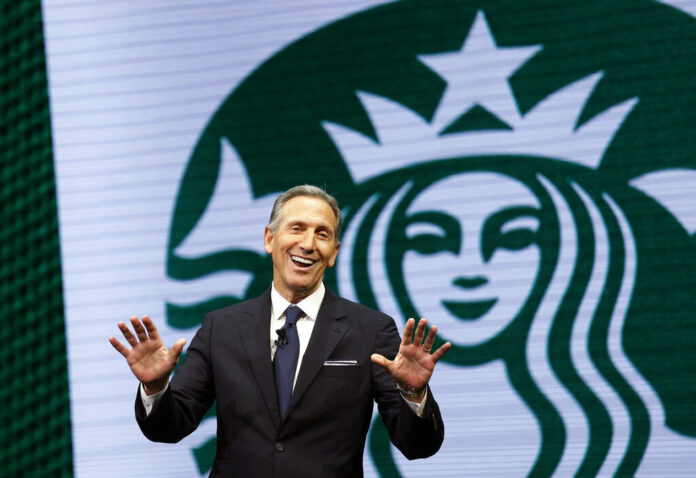 Starbucks CEO Howard Schultz speaks in 2017 at the Starbucks annual shareholders meeting in Seattle. Photo: Elaine Thompson / Associated Press